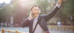a happy man waving