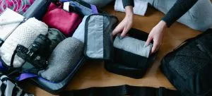 A girl packing suitcase