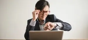 a man looking at his watch