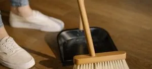 A person cleaning a home.