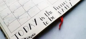 A calendar in a notebook.