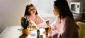 A mother and daughter talking, which is important step when you want to include your kids in the upcoming international move.