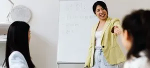 A woman holding a presentation.