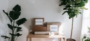 Cardboard boxes on the wooden table.